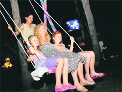 Marianne (centre) with her kids and host at a Teej festival held in Ludhiana on Sunday night