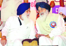 SGPC chief Avtar Singh Makkar and CM Parkash Singh Badal at the opening ceremony of Sri Guru Granth Sahib World University at Fatehgarh Sahib on Monday