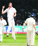 Englands James Anderson (L) reacts after dismissing Sachin Tendulkar at Lord's on Monday.