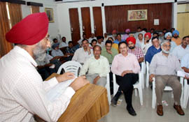 Karnail Singh Mann, vice-president of the PSEB Engineers Association, addresses a meeting of engineers held in the Officers Club at the Thermal Colony in Bathinda 