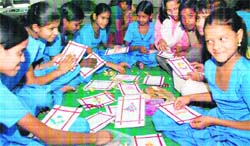 Underprivileged children from Matour village display Rakhi cards made by them at Satya Narayan Mandir in Sector 70 of Mohali.