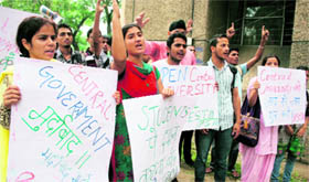 Members of the Progressive Students Association raise slogans against the Central government for its failure to start the Central University of Jammu on Tuesday.
