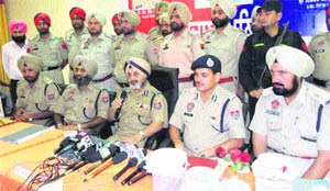 Punjab Police DGP PS Gill (centre) flanked by IG (Jalandhar Zone) Ishwar Singh (on his left) addressing a press conference at Mandi Gobindhgarh 