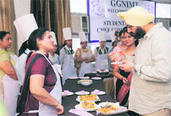 Dignitaries being offered delicacies at GGNIMT in Ludhiana 