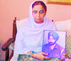 Gurvinder Kaur, widow of Hav Darshan Singh, at Iraq village