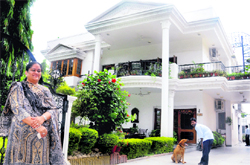 Vinita Talwar stands outside her abode in Sector 8.