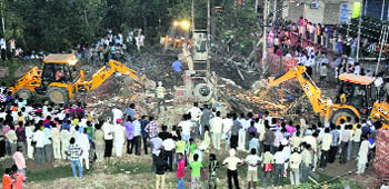 Rescue operations in progress at the site of the collapsed building in Kharar