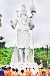 The 108-foot-high idol at the Lord Shiva temple in Haridwar. Kanwariyas are paying obeisance at the temple in large numbers