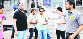 SOI activists protest at Panjab University in Chandigarh on Thursday.