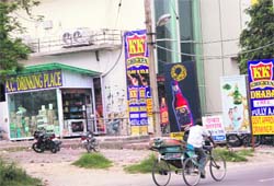 A liquor vend being allowed to run illegally from a verandah of a shopping mall of SAD MLA Sarabjit Makkar in New Jawahar Nagar, Jalandhar