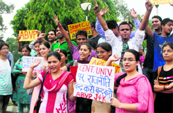 Activists of the ABVP stage a protest on Thursday against the delay in making the Central University of Jammu functional