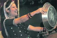colourful bash A woman all smiles during Teej celebrations in Ludhiana