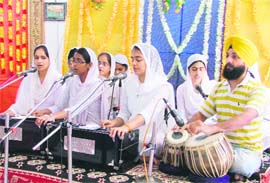 Students recite Gurbani to commemorate the new session at Master Tara Singh Memorial College in Ludhiana on Thursday. Photo: Inderjeet Verma