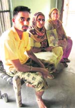 Baljit's mother (centre) and neighbours at Sanghowal village.