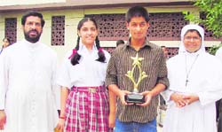 Ashu (second from right) with Father Roby (extreme left) during a function at St Francis School in Amritsar.