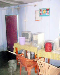 Buckets being used to collect water leaking from the ceiling of the headmistress room of Girls Junior High School in Mussoorie