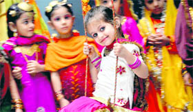 Students of Guru Nanak Public School, Model Town, celebrate Teej in Ludhiana on Friday.
