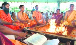 Baba Ramdev and Acharya Balkrishna perform havan at Patanjali Yogpeeth in Haridwar 