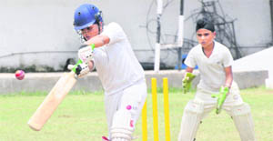 A batsman plays a shot during a match of the second St Joseph's U-13 Champions Trophy at St Jospeh's School in Chandigarh 