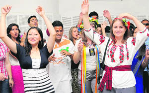 Foreigners revel during a cultural lunch organised by AIESEC at Indira Holiday Home,  Sector 24, Chandigarh. 