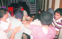 Gurbaksh Singh being beaten up by his son and relatives in his house at Shimlapuri 