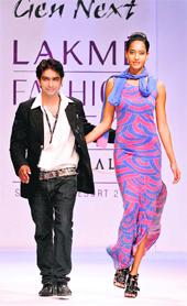 Vipin Batra walks the ramp with a model
