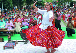 A woman performs dance during the Teej celebrations organised by the Phulkari Club at Kamala Nehru Colony in Bathinda on Sunday