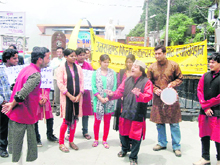 Artistes stage a street play at Mussoorie on Sunday. 