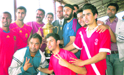 The Ex-Modernite team with the trophy in Mussoorie 
