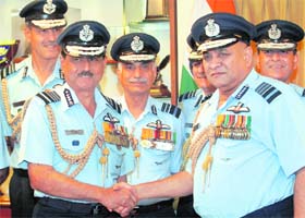 Air Chief Marshal NAK Browne (L) with outgoing Air Chief PV Naik in New Delhi