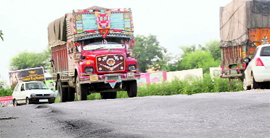 A bumpy stretch of the Jammu-Srinagar National Highway near Nandni.