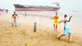 The Panama-flagged vessel MV Pavit on the Juhu beach in Mumbai on Sunday. The ship drifted across the Arabian Sea from Ras Al Madrakah in Oman following engine failure and flooding of its engine room. It is the second ship, after MV Wisdom, to be grounded at the popular beach in the past six weeks.