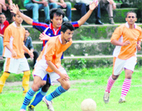 A match in progress in the Lala Nemi Dass Memorial District Football League on the Pavilion grounds in Dehradun on Monday. 