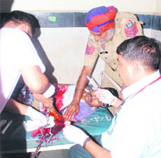 The accused being taken to the Zonal Hospital in Mandi 