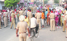A heavy police force deployed at Santokhpura Mohalla and surrounding localities after the alleged killing of 30-year-old youth Sonu Giri at Lamba Pind in Jalandhar on Monday. 