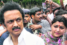 DMK leaders MK Stalin and Khushboo being arrested during a protest demonstration against the foisting of land-grab cases on partymen by the ruling AIADMK, in Chennai 