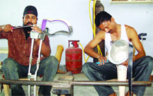 Artisans make artficial limbs at prosthetic centre at Pingalwara in Manawala. 