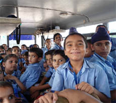 An overloaded school bus at village Kotshamir in Bathinda district. 