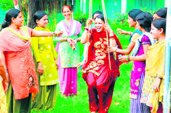 Women celebrate Teej Vrata in Haridwar on Tuesday