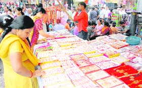 Women buy rakhis in Dehradun on Tuesday