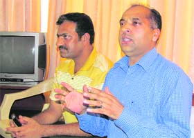 Rural Development Minister Jai Ram Thakur talks to mediapersons in Mandi on Tuesday