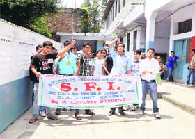 SFI supporters hold a rally on the MCM DAV College premises in Kangra on Tuesday