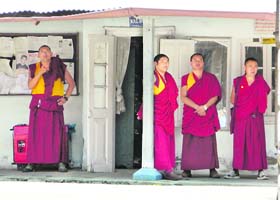 Tibetan monks at the Kangra police station on Tuesday