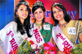 Payal Tanta (centre), the winner of Miss Fresher title, flanked by Bhumika Sharma, first runner-up, and Dimple, second runner-up, at RKMV College in Shimla.