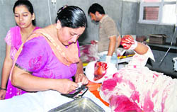 One of the injured, who met with an accident in Jagraon, being treated at the Civil Hospital. 