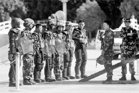 Policemen deployed at a square in Kashgar on Tuesday