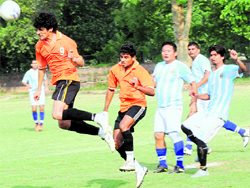 Players of Post Graduate Government College and AG, Haryana, slug it out during a match