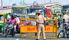 Delhi police personnel keep vigil ahead of Independence Day in New Delhi on Wednesday