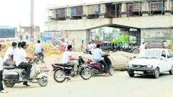 Commuters caught up in a mess due to the ongoing widening work of NH-1.