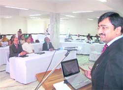 A speaker delivers a talk at a principals conference in Mussoorie